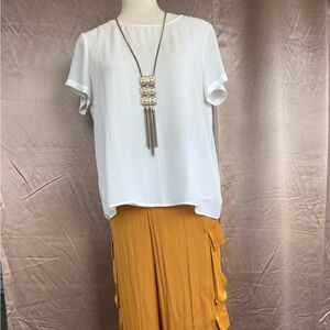 Butterfly back silk top and Zara Mustard Yellow silky cargo jogger
